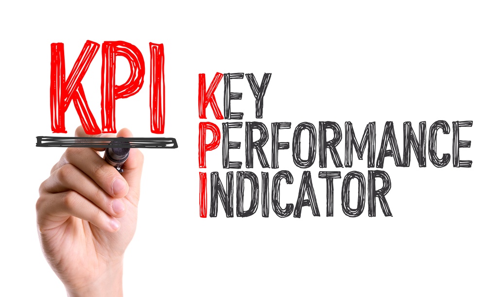 Hand with marker writing KPI.jpeg